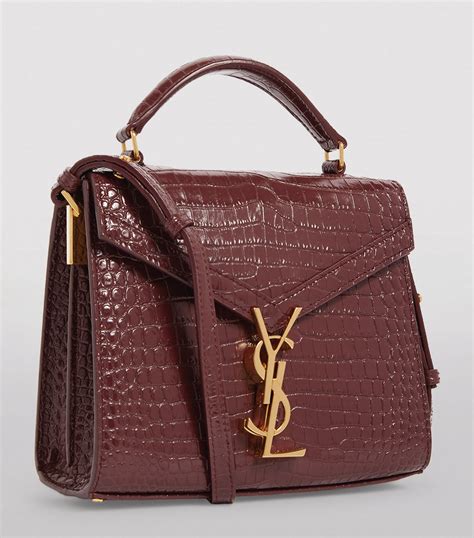 ysl cassandra top handle bag mini|Mini Cassandra Leather Top Handle Bag .